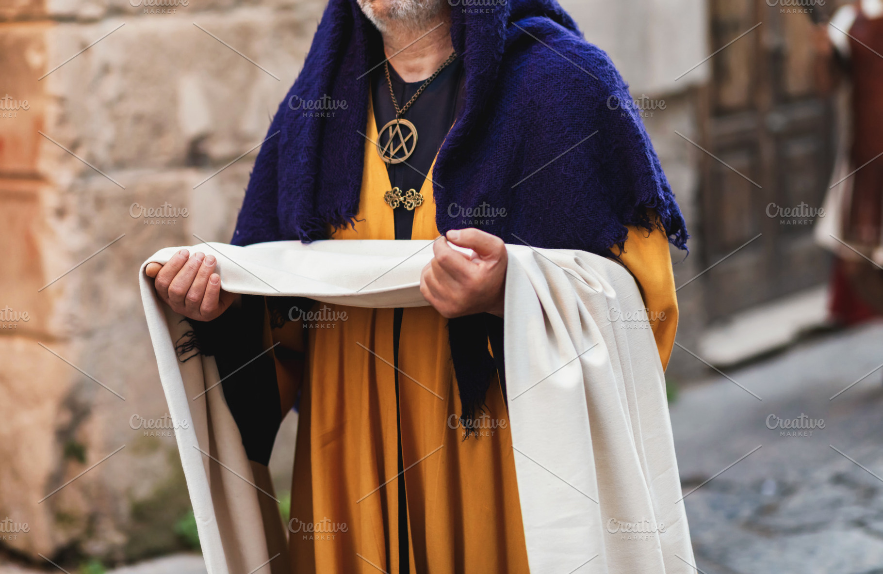 Joseph of Arimathea holding the Holy Shroud during a historical reenactment in, a Holiday Photo by Antonio Gravante Market