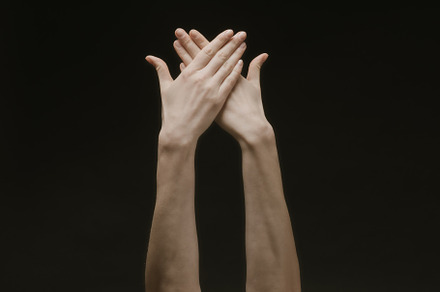 Woman hands in the dark