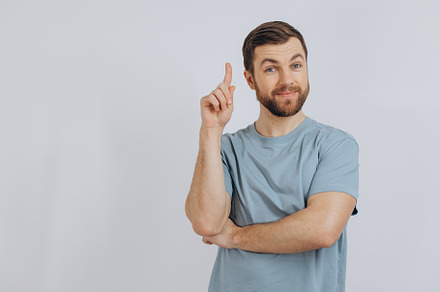 Portrait of a modern bearded middle-aged man in a blue t-shirt s, a Person Photo by Cherkas Photography