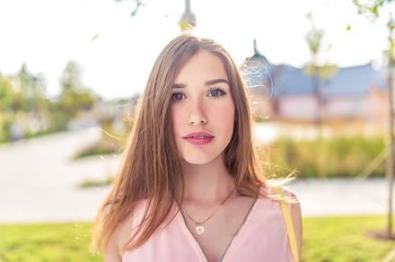 Closeup portrait of a beautiful featuring woman, girl, and fashion