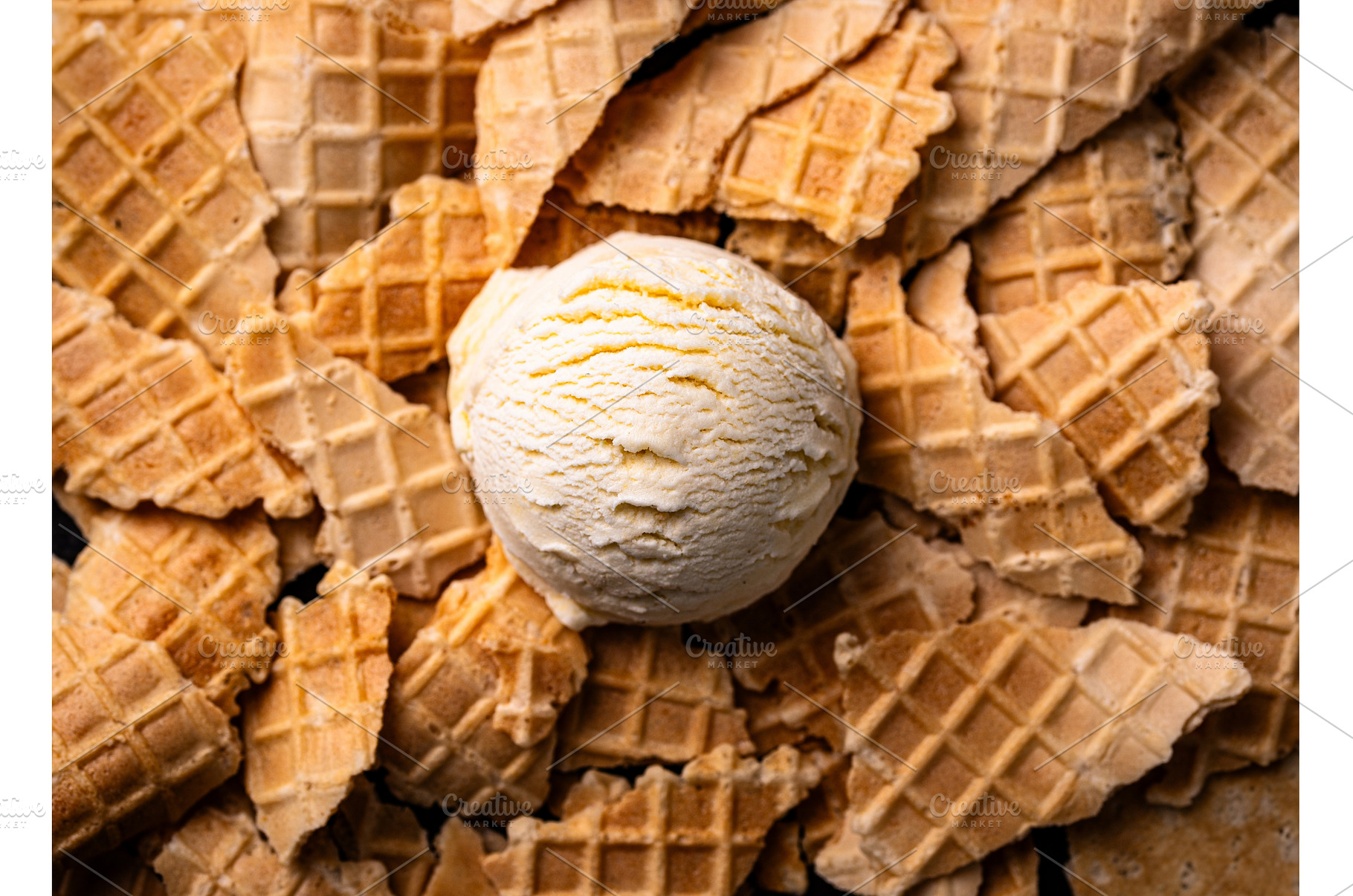 Ice cream and waffle cones on black, a Food & Drink Photo by Yulia Furman