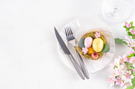Easter holiday table setting with cutlery, a Holiday Photo by Rimma