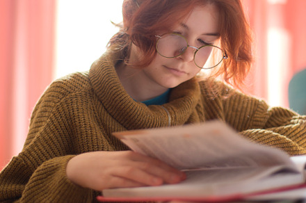 schoolgirl with glasses doing homework., a Photo by Pictures for you!!!!!!!!!