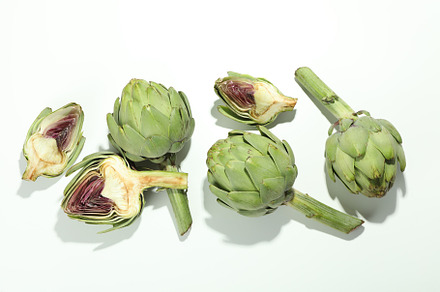 Concept of healthy food with artichoke on white background, a Food & Drink Photo by AtlasStudio PRO