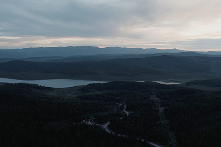 Aerial view on lakes and mountains with dramatic sky in Altai, a Nature Photo by TravelFlow