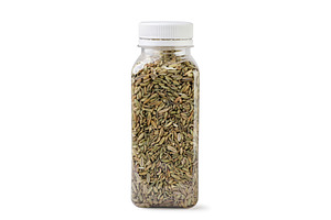 Fennel seeds in a plastic bottle on, a Food & Drink Photo by innakreativ