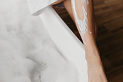 Young woman shaving legs using safety razor, removing hair, making depilation i, a Photo by Prostock-Studio (Thumbnail 1 of 2)