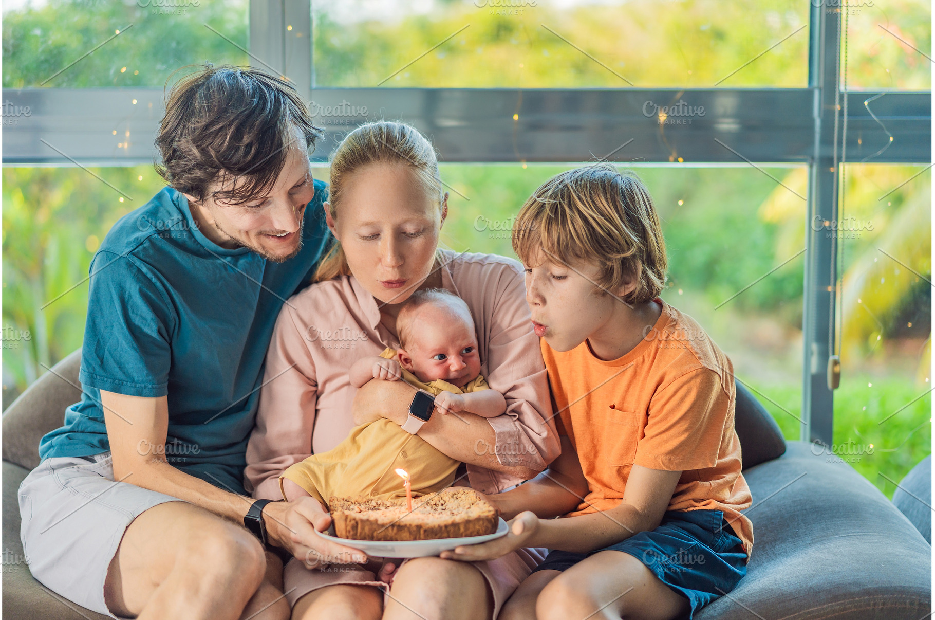 Happy family celebrating their, a Person Photo by Elizaveta Galitskaya