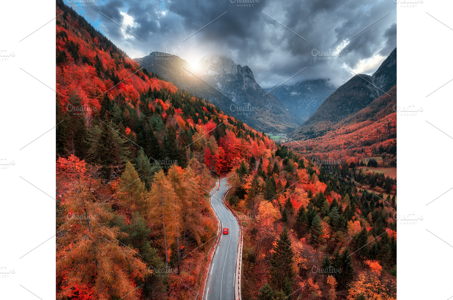 Aerial view of winding mountain road, a Nature Photo by den-belitsky