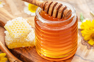 Natural organic honey in glass jar, a Food & Drink Photo by Volff