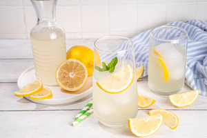 Iced homemade lemonade drink, limoncello liqueur cocktail, a Food & Drink Photo by Rimma