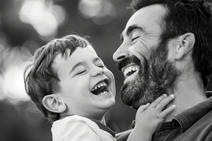 A man holding a little boy, both lau, a Photo by Iftikhar Alam