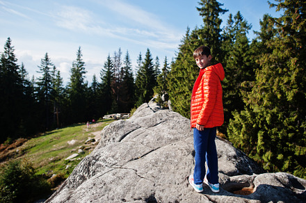 Boy on top of mountain. Children hiking on beautiful day in moun, a Person Photo by AS photostudio
