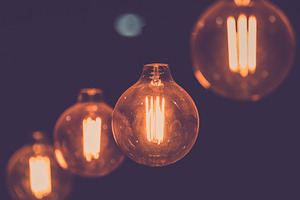 Edison light bulb decor featuring antique, architecture, and art