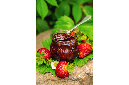 Homemade strawberry jam in a jar, a Food & Drink Photo by yanadjana