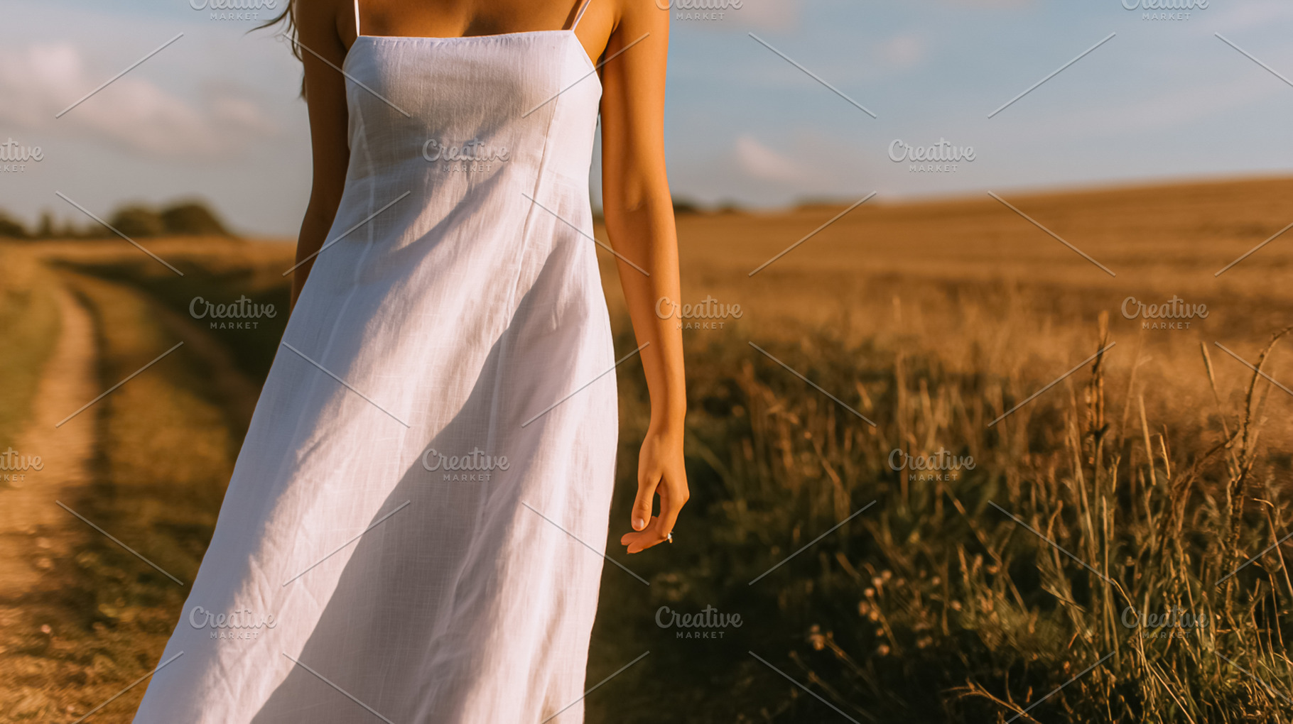 Woman walking in country field during golden hour, experiencing, a Photo by Studio ANNA