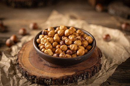 Close up of roasted hazelnuts, a Photo by Grafvision photography