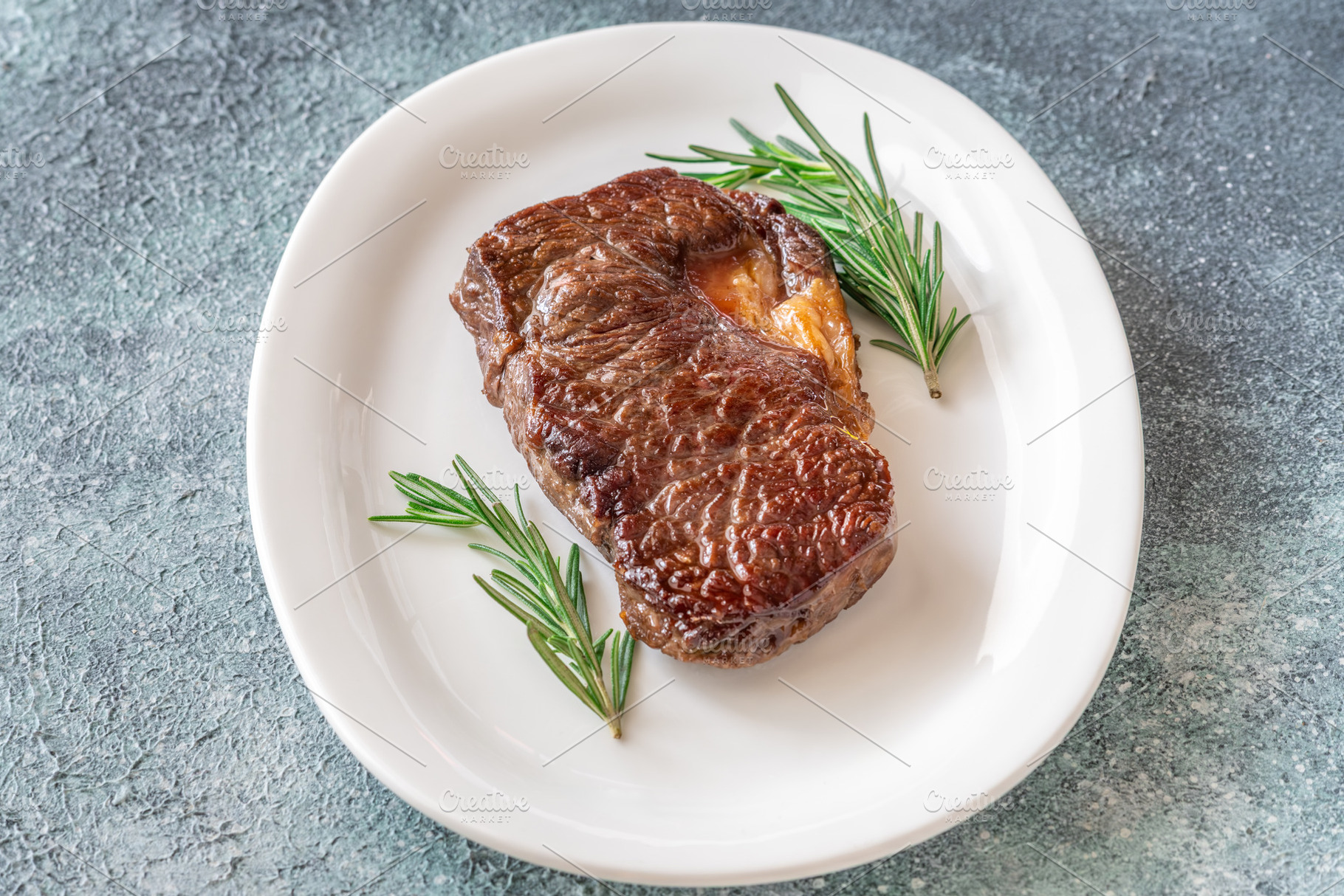 Perfectly grilled beef steak, a Food & Drink Photo by Alexander Prokopenko