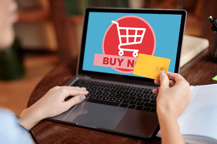 Woman using laptop and credit card at home, shopping online, a Background Photo by Prostock-Studio