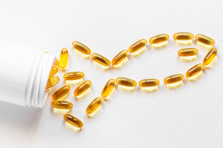 jar with omega 3 capsules, a Health & Medical Photo by itakdalee