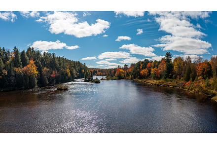 Saranac river flows through multi, a Nature Photo by Backyard Stock
