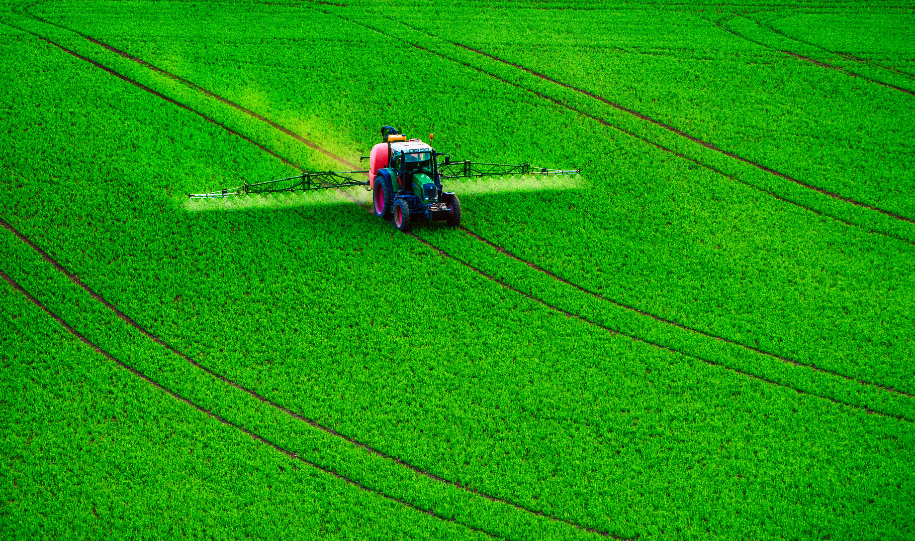 Farm machinery spraying insecticide featuring tractor, field, and farm ...