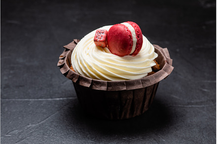 Appetizing cupcake with white cream, a Food & Drink Photo by oksix