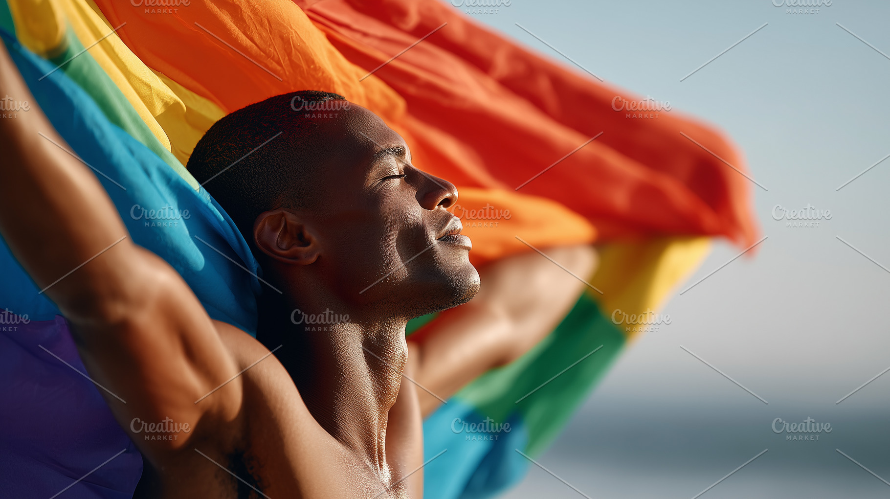 Young black man holding rainbow flag, a Person Photo by MistyDay
