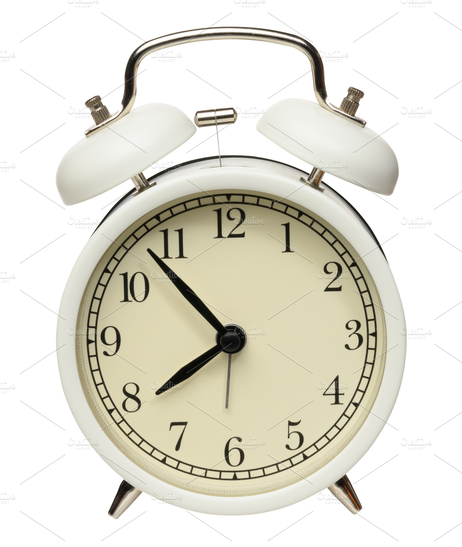 Classic white table alarm clock with two metal bells and a hamme, an Abstract Photo by ndanko