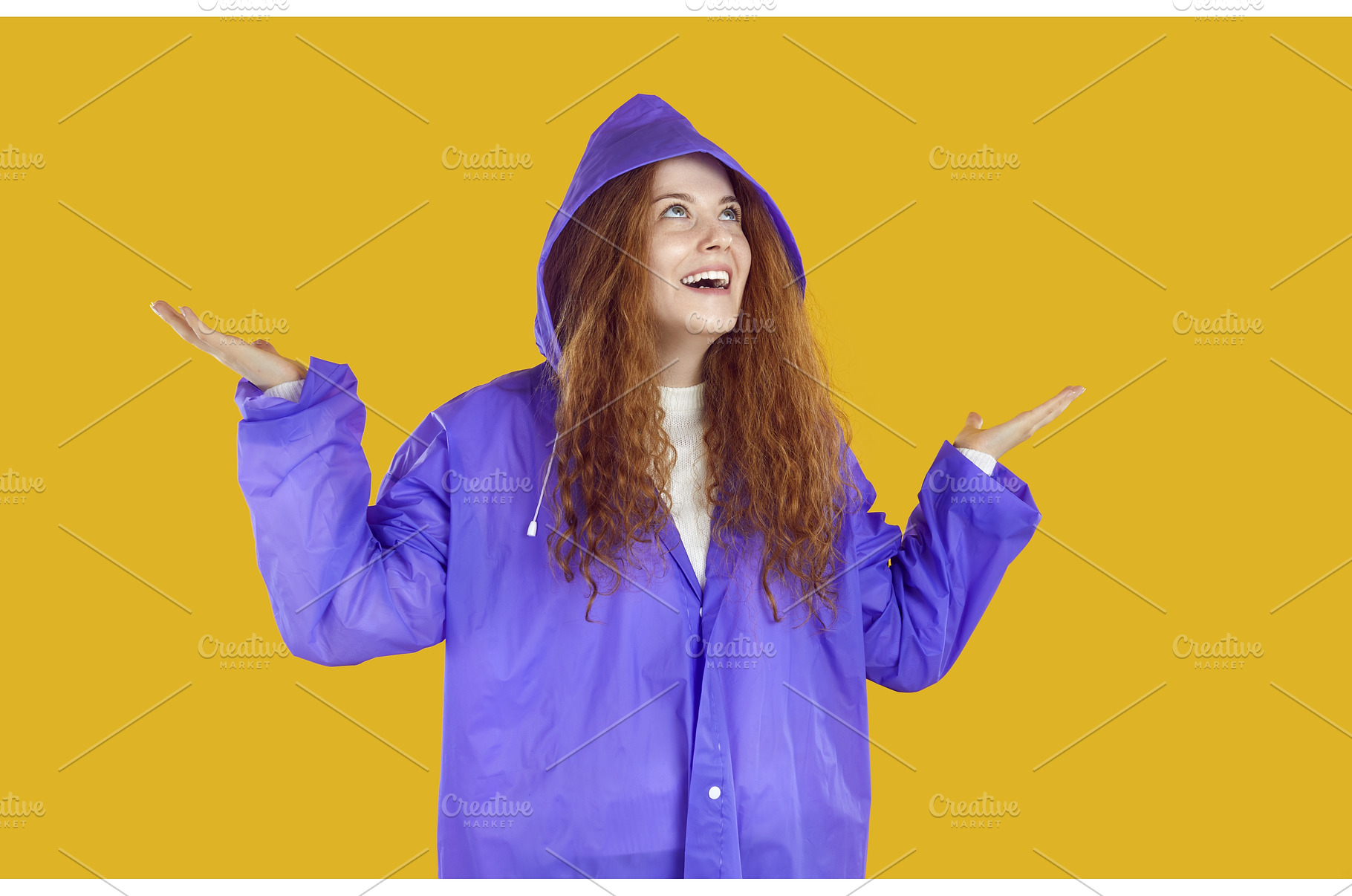 Happy young woman in purple raincoat, a Person Photo by StudioRomantic