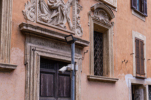 Architectural decor of the building in historical part of Rome,
