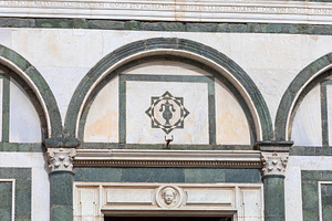 Detail of the Collegiata di Sant'Andrea facade showing marble decoration and la, a Photo by Antonio Gravante Market