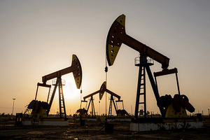 Silhouettes of Oil Pump Jacks, a Photo by rarrarorro