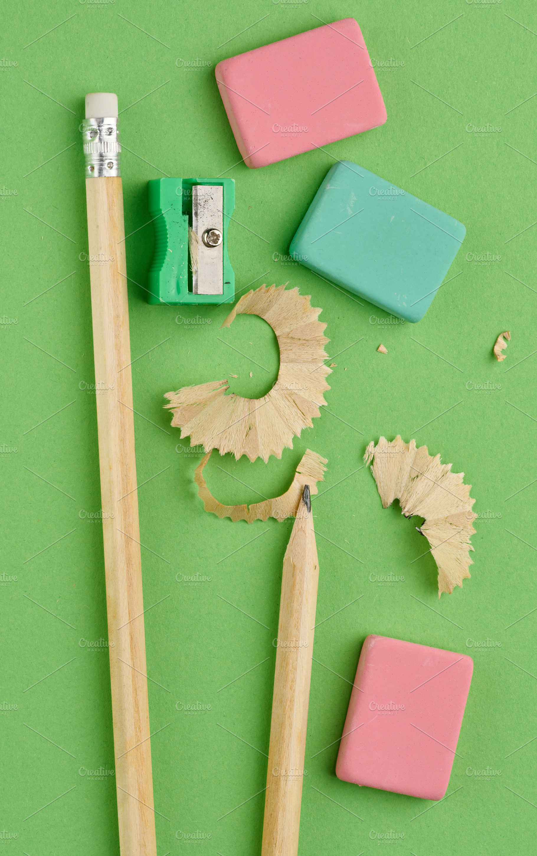 Green plastic pencil sharpener, sharp wooden pencil and figured, a School & Education Photo by ndanko