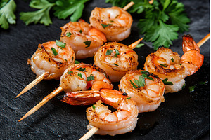 Grilled shrimp skewers with herbs on, a Food & Drink Photo by Lermont51