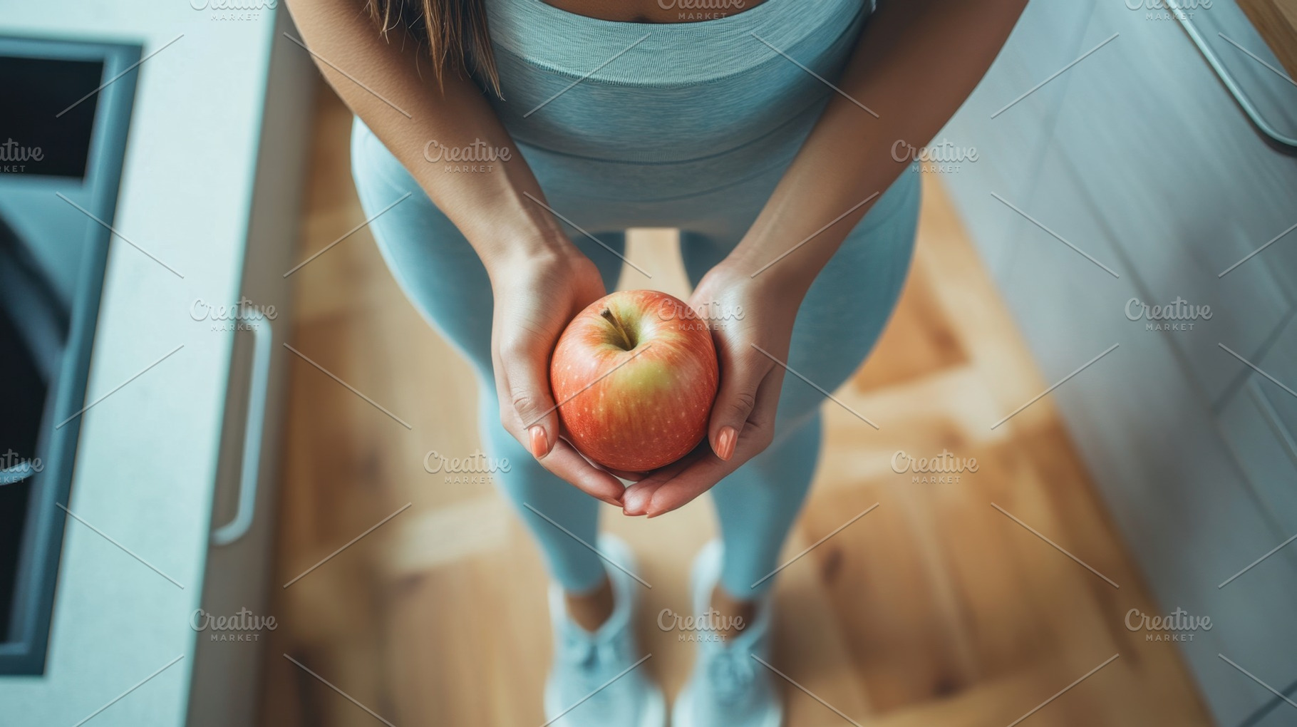 Woman with apple in kitchen, a Photo by Beautiful things