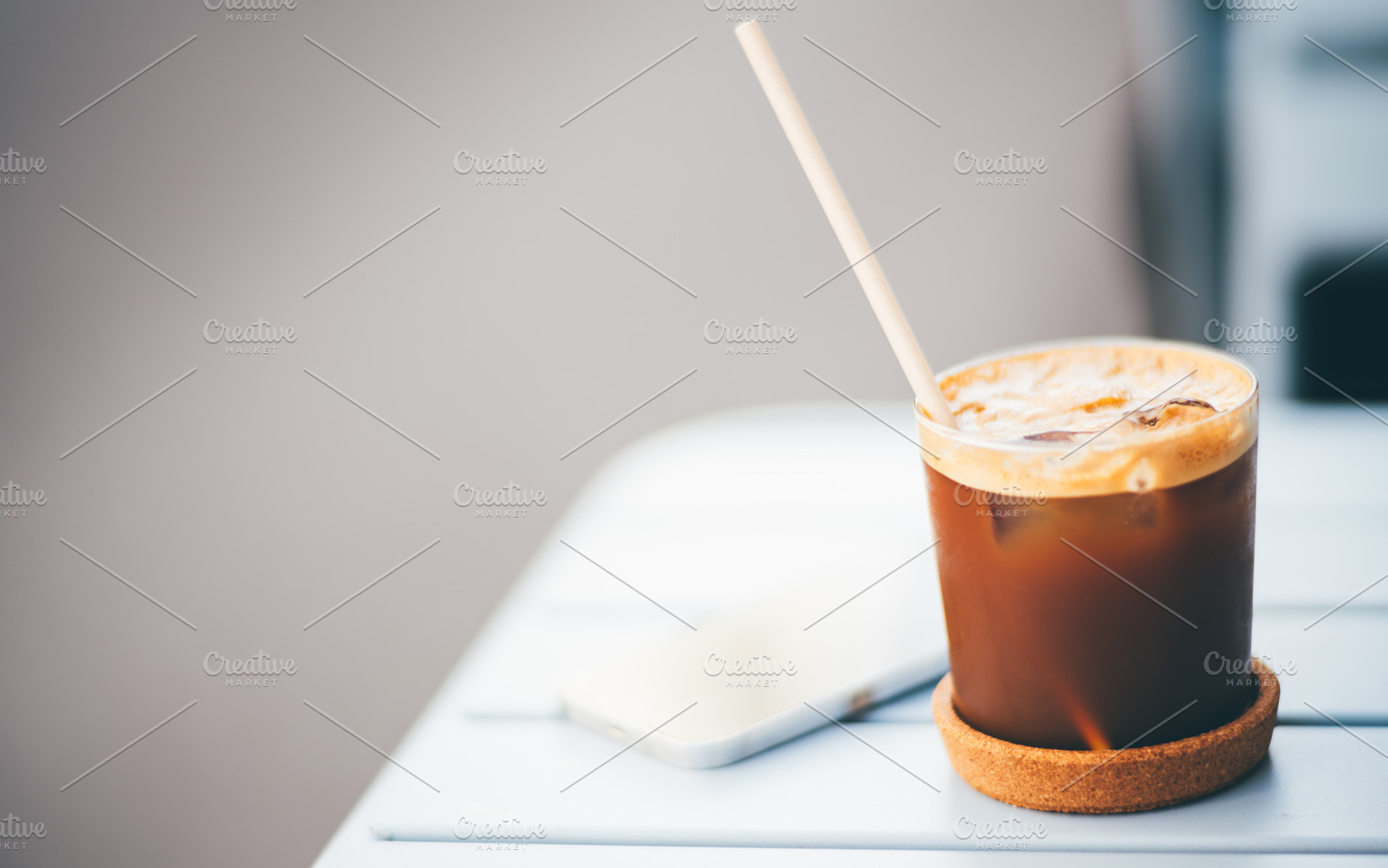 Iced espresso tonic on a cafe table, a Food & Drink Photo by SkyNext