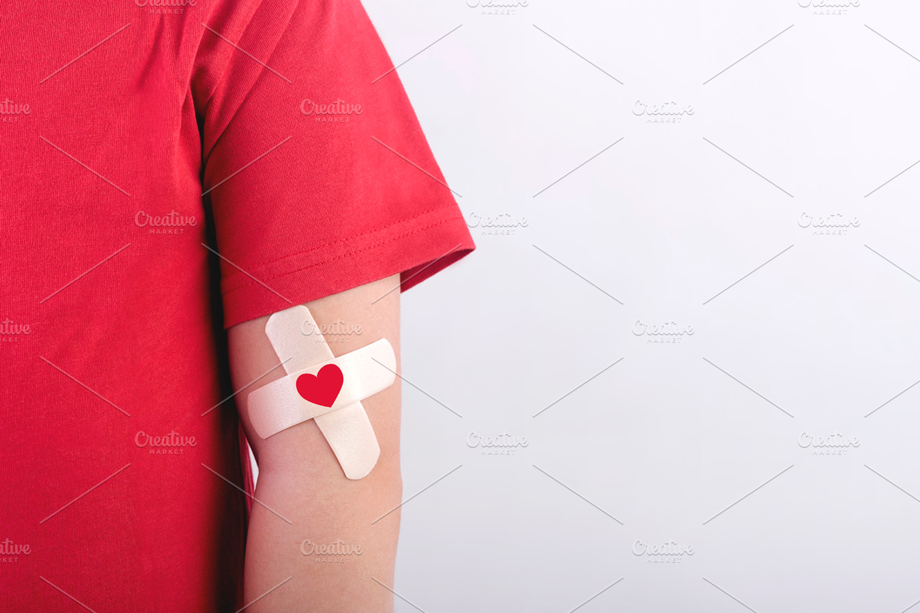 Blood donation concept featuring child, heart, and blood, a Health & Medical Photo by esthermm