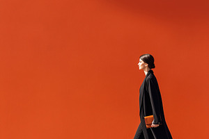 Elegant businesswoman walking, a Business Photo by MistyDay