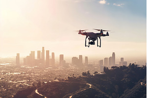 Drone Flying Over Urban Landscape at, an Industrial Photo by Lermont51