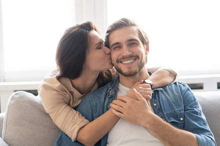 young couple analyze their finances, a Person Photo by OPOLJA