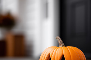 Glowing carved pumpkin on a stone, a Holiday Photo by MistyDay