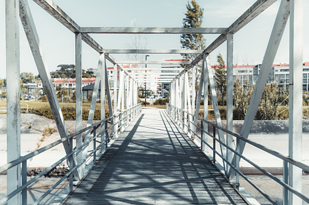 Modern pedestrian bridge with beams, an Architecture Photo by SkyNext