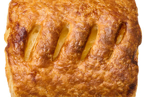 Rectangular puff pastry with apple filling on a white background, a Food & Drink Photo by ndanko