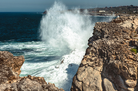 wave breaking against the rocks, a Nature Photo by Perpis