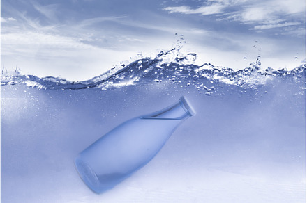 transparent glass bottle underwater