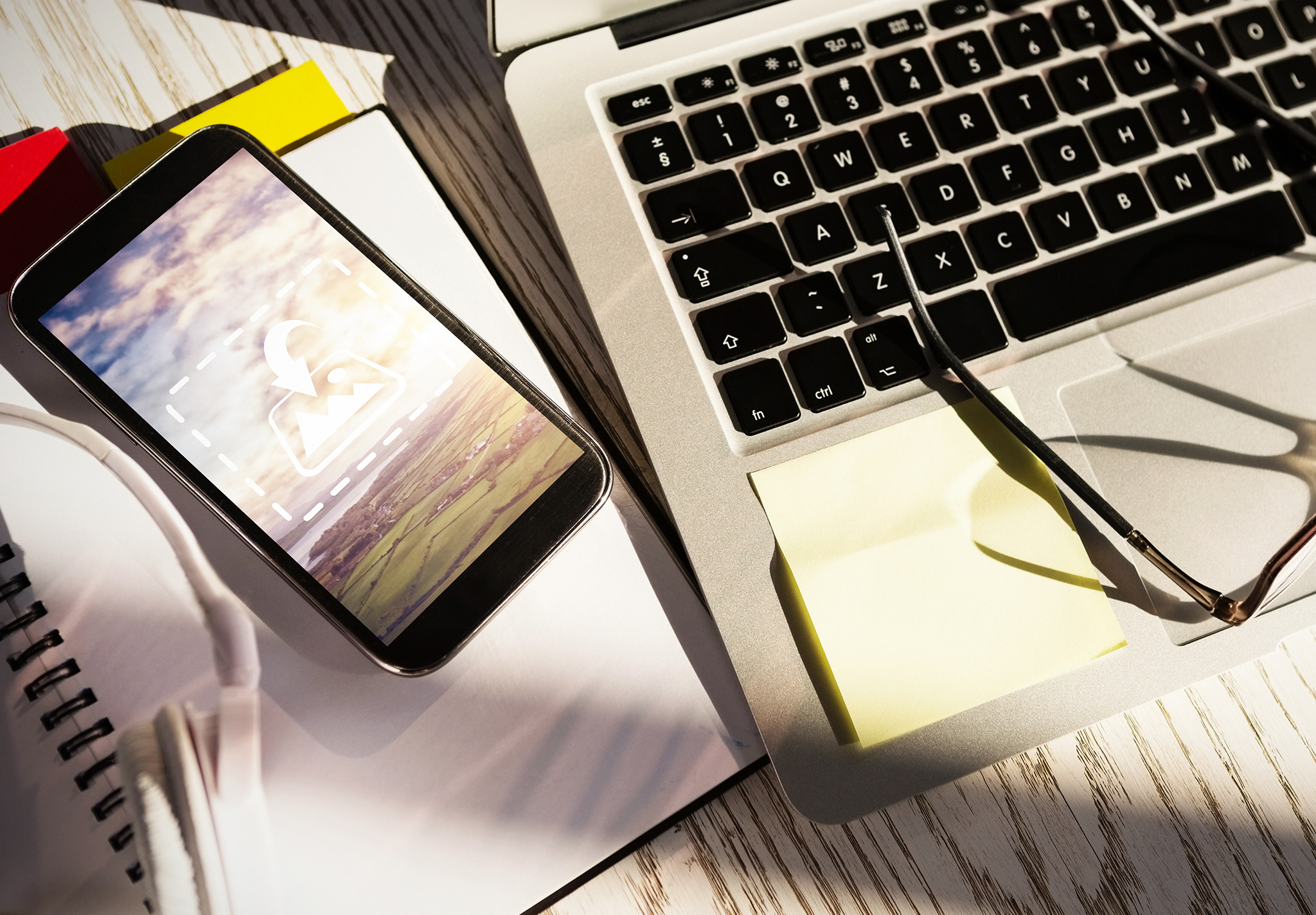 Phone and laptop, a Websites & App Template by wavebreak