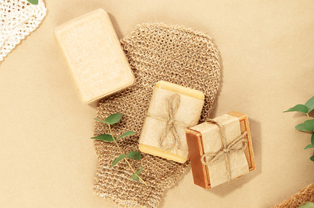 Top view photo of natural hand made soap bar and washcloth on na, a Beauty & Fashion Photo by Natalia Klenova's Shop