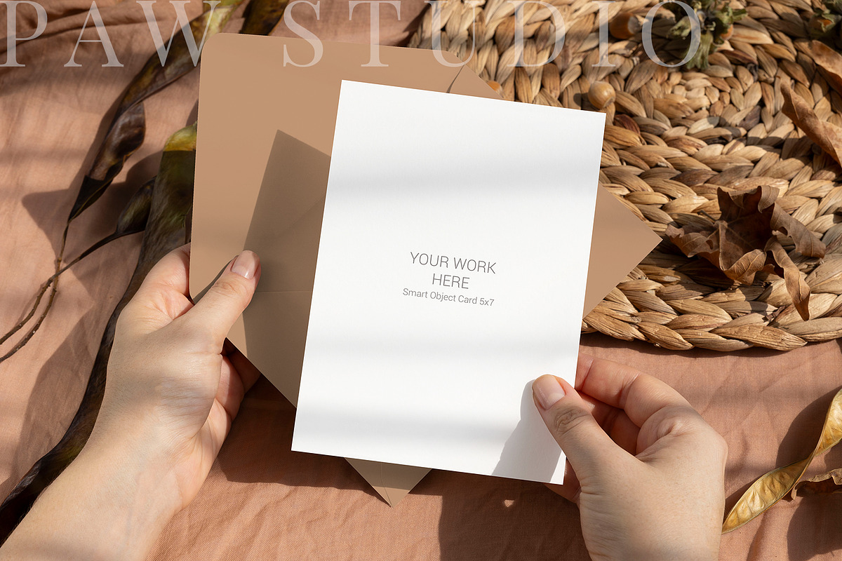 Card Mockup 5x7 In Hand 8e fall2, an Advertising Mockup by PawMockups (Photo 2 of 11)