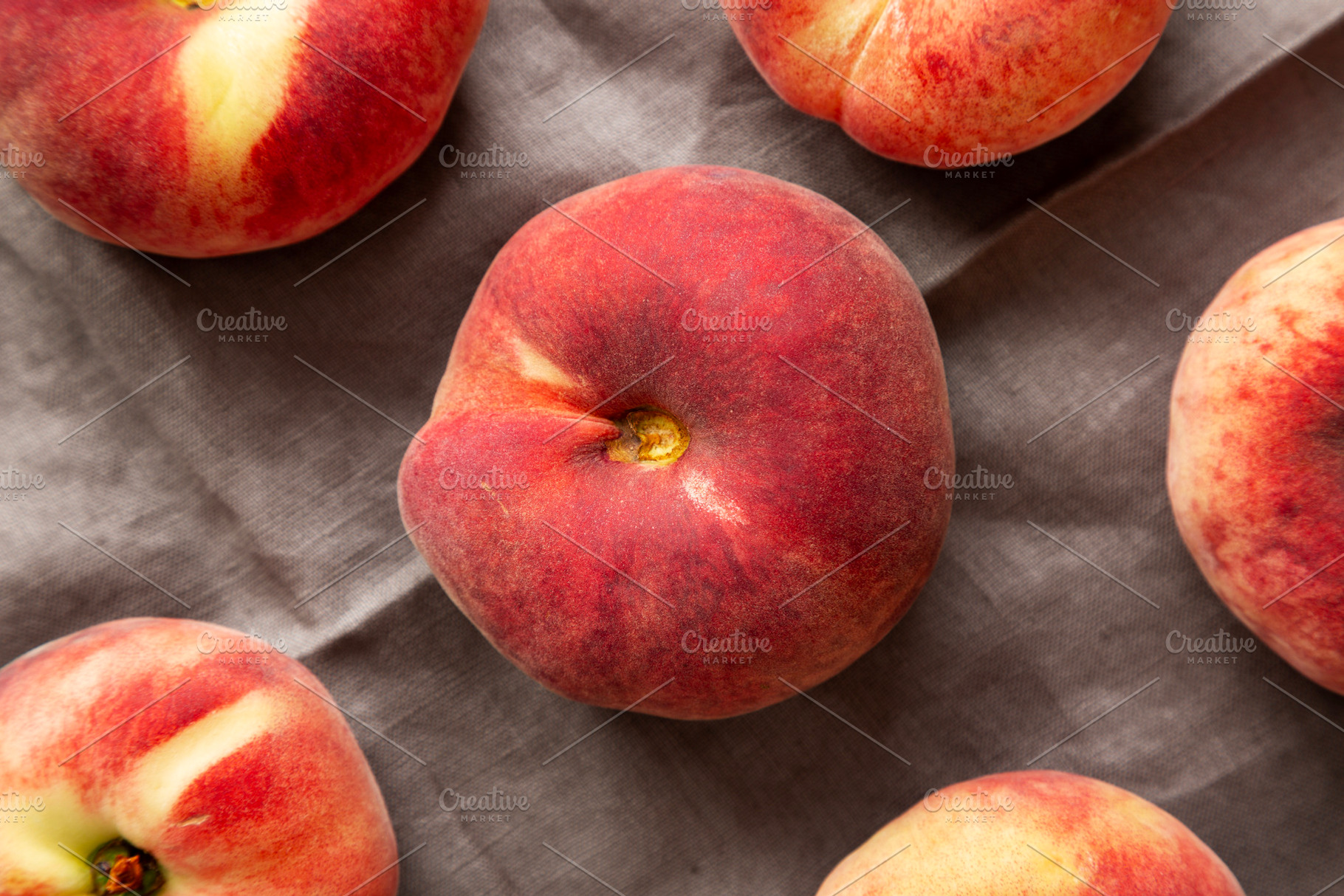 Fresh juicy ripe fig peaches, top view. Overhead, from above., a Food & Drink Photo by LiudmylaChuhunova